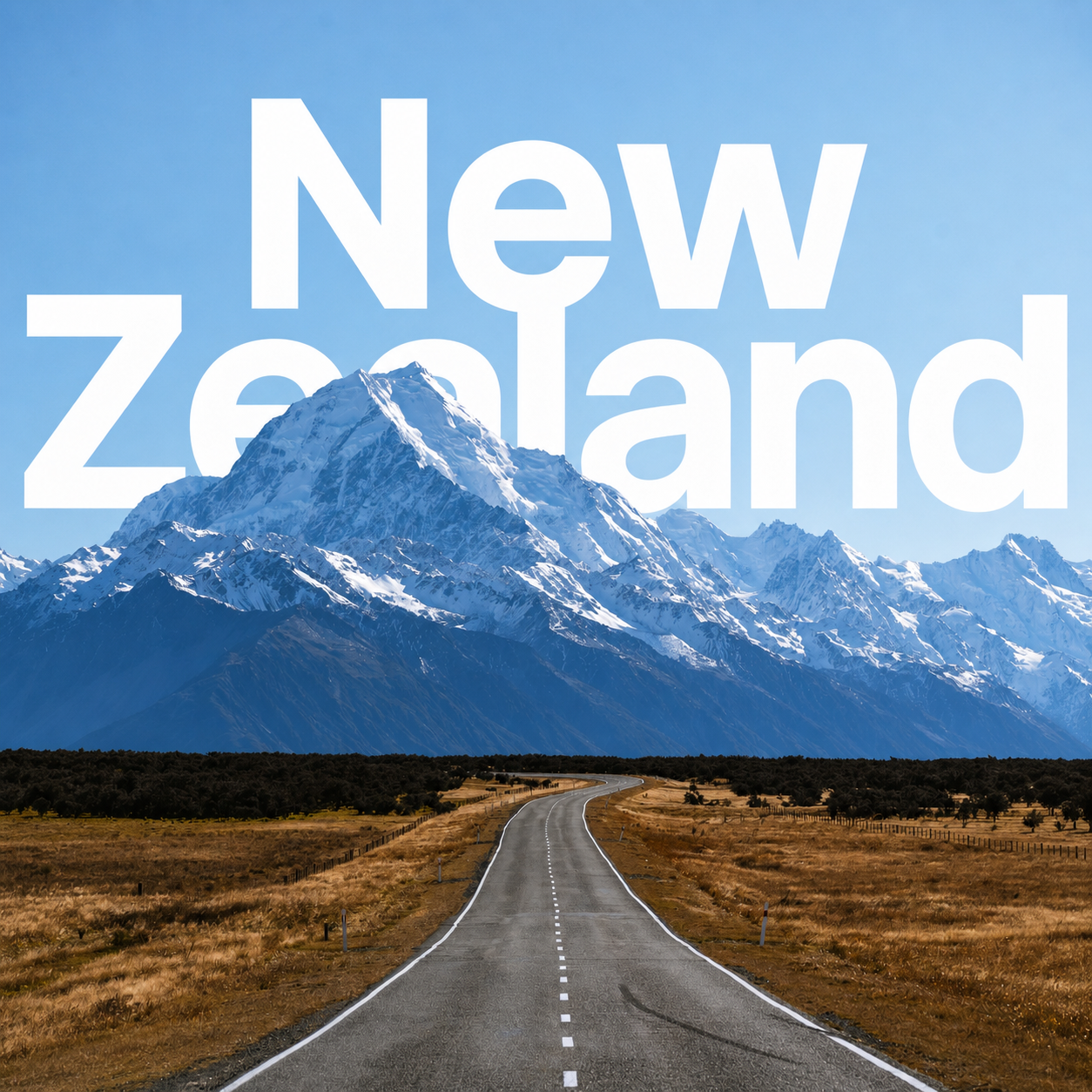 A New Zealand mountain road with snow covered peaks.