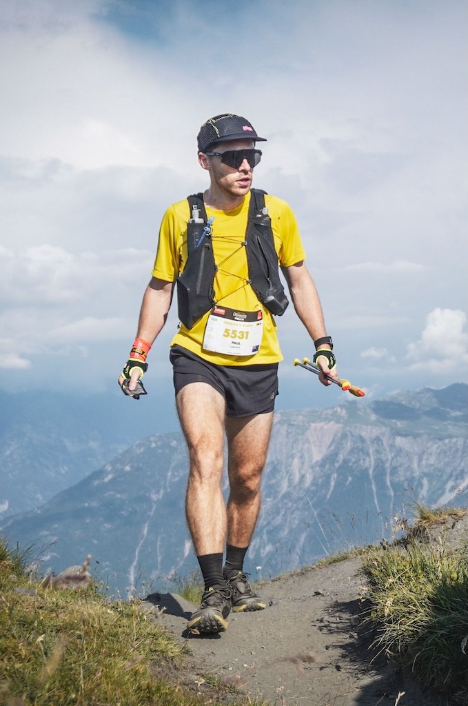 Paul trail running in the mountains during a race.