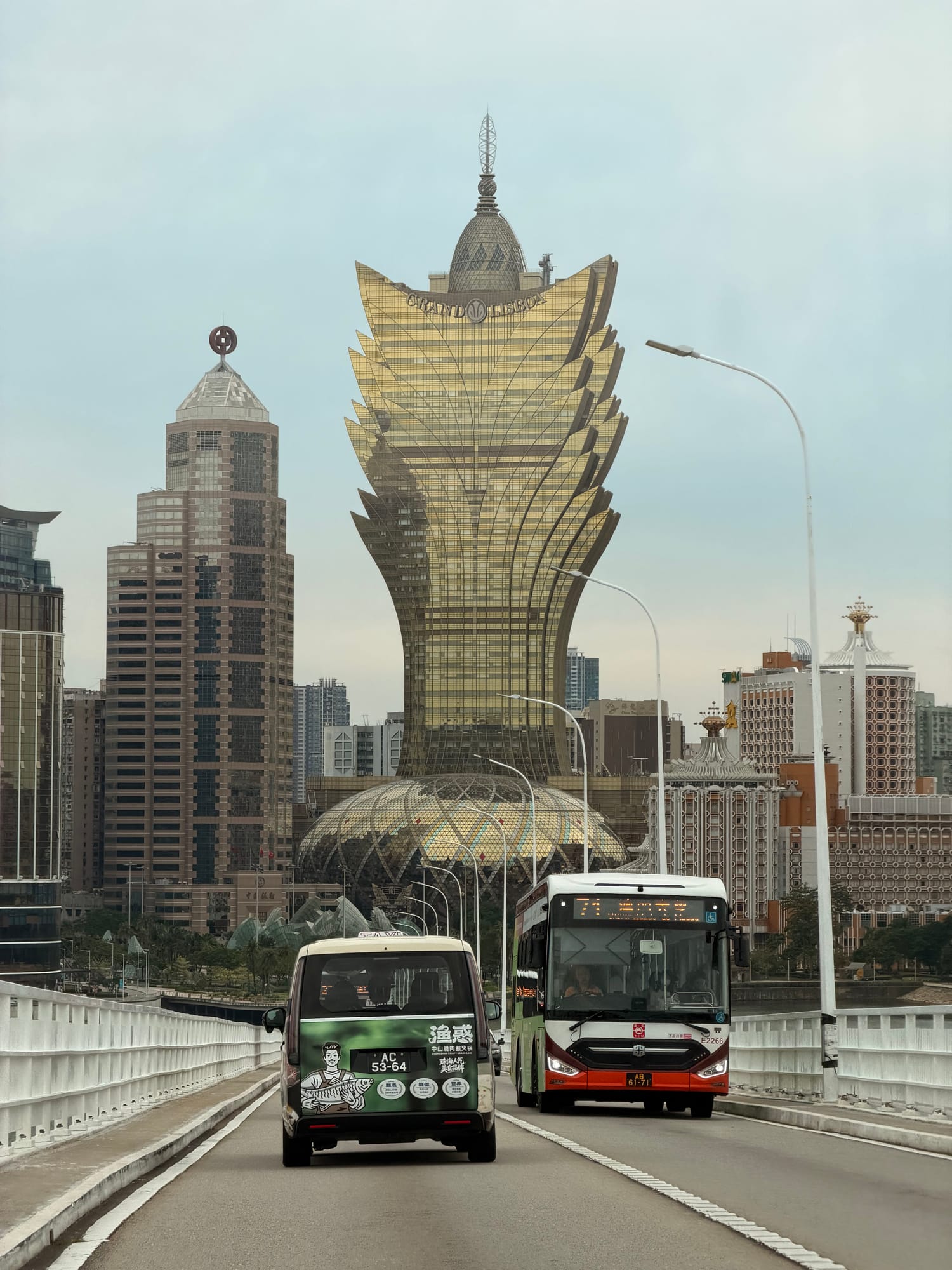 Trip photo: the Grand Lisboa rising over the bridge on the morning taxi out of Macau