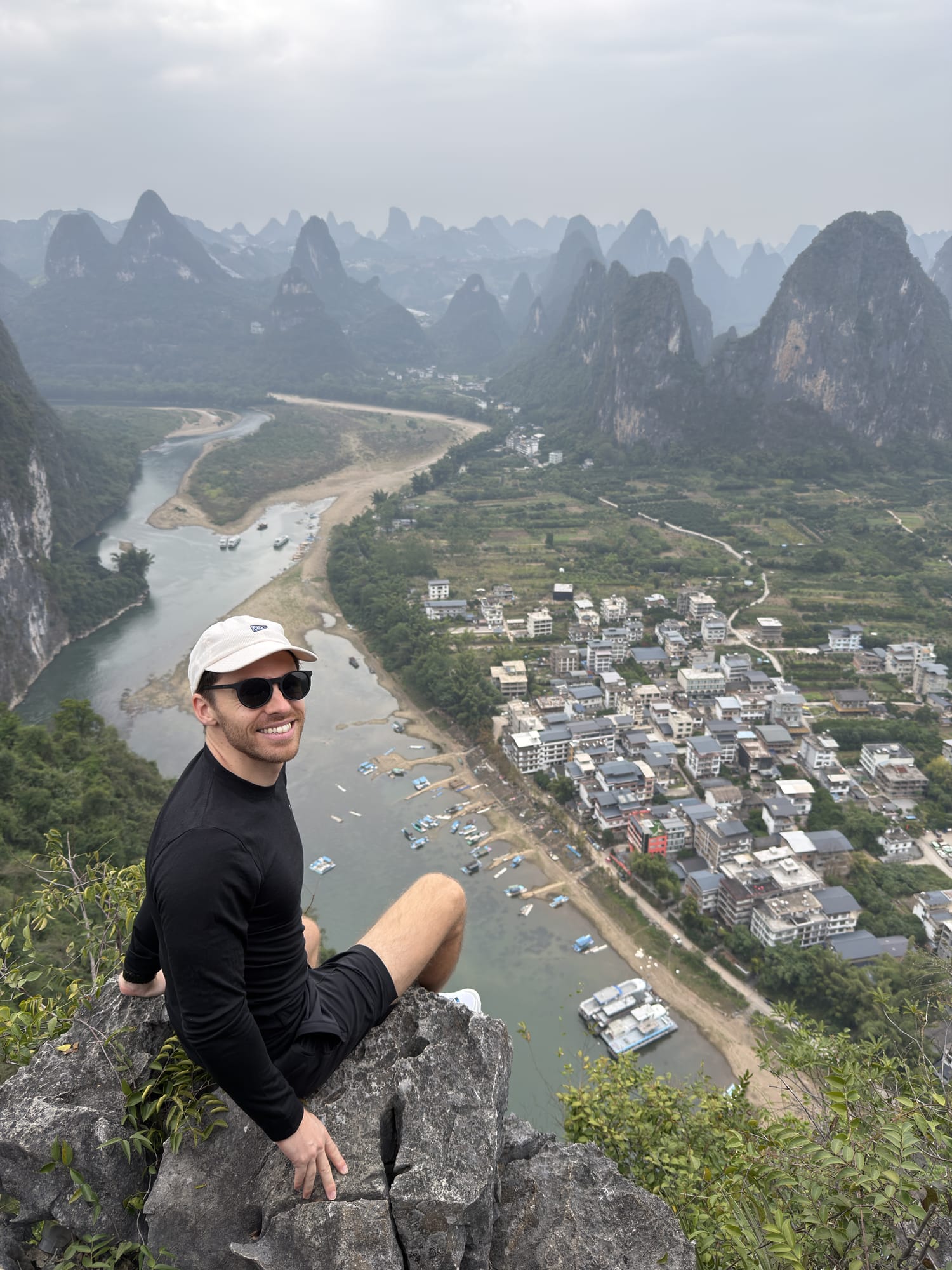 Trip photo: on the summit rock of Laozhai Hill above the Li River bend at Xingping