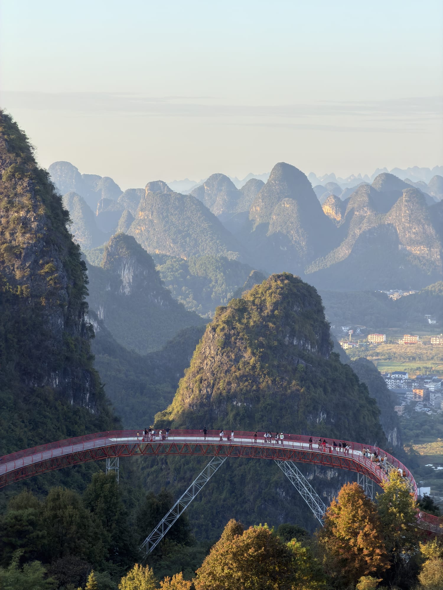 Trip photo: the skywalk bridge threading the karst at Ruyi Peak, an hour before close