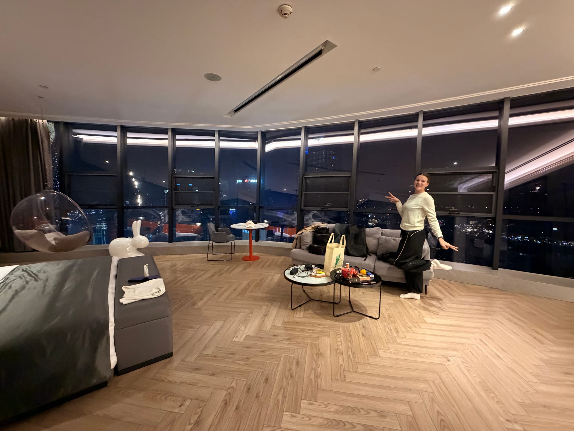 Trip photo: the $70 penthouse and its wall of glass. This is the going rate here