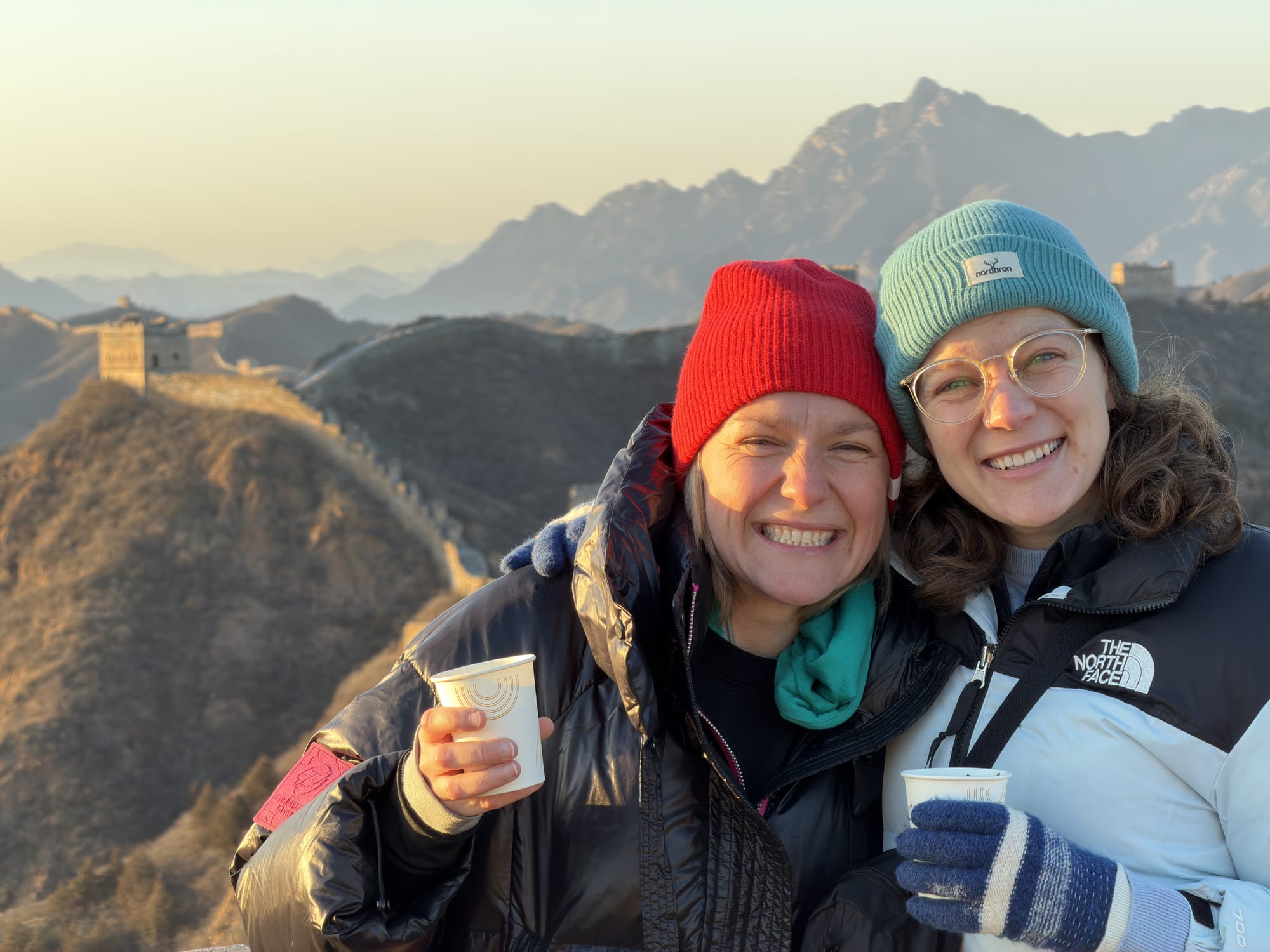 Trip photo: coffee on the wall at dawn, sold by a woman who materialized out of the dark