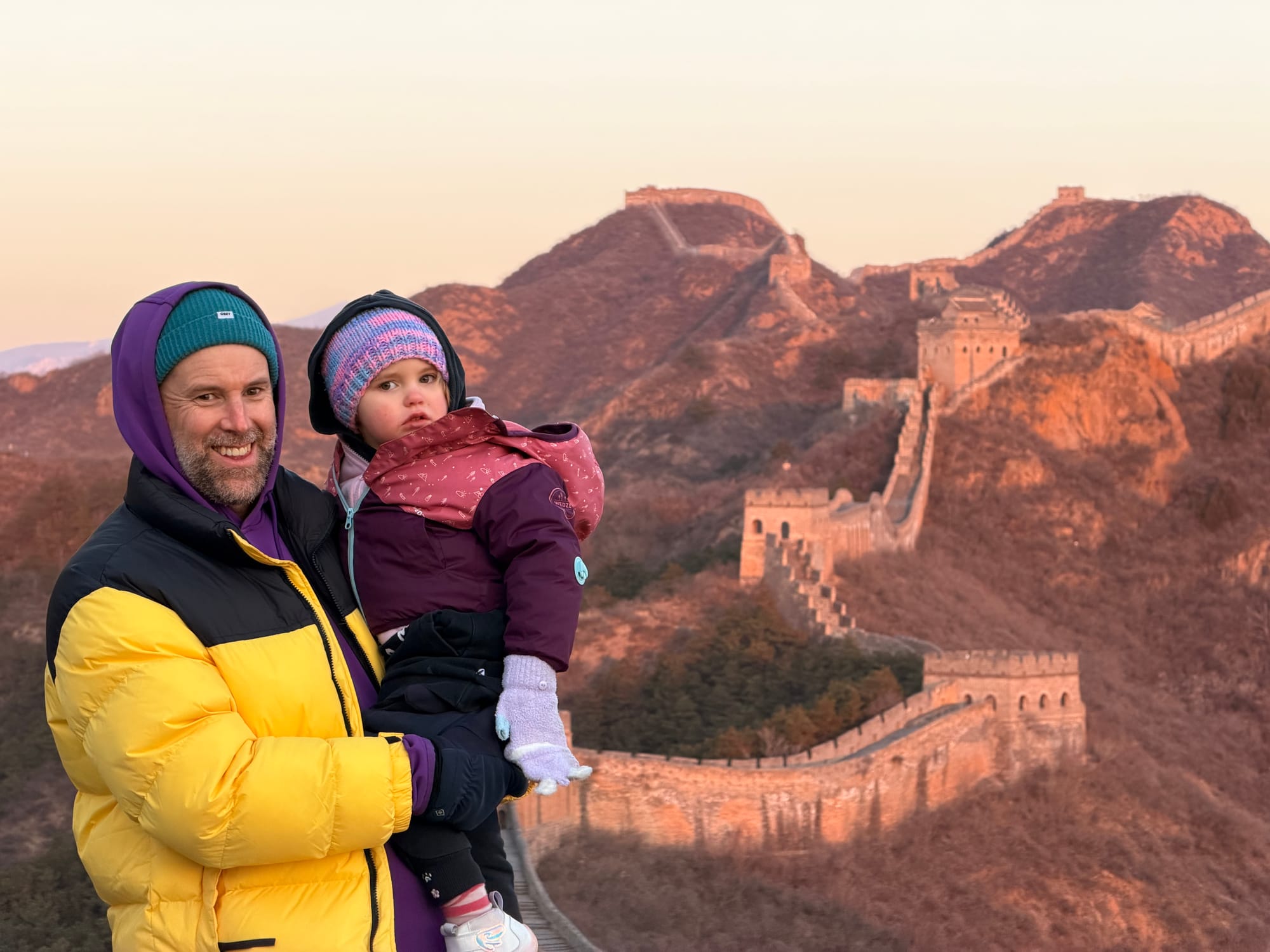 Trip photo: the wall rolling away tower to tower at sunset. The best frame of the month