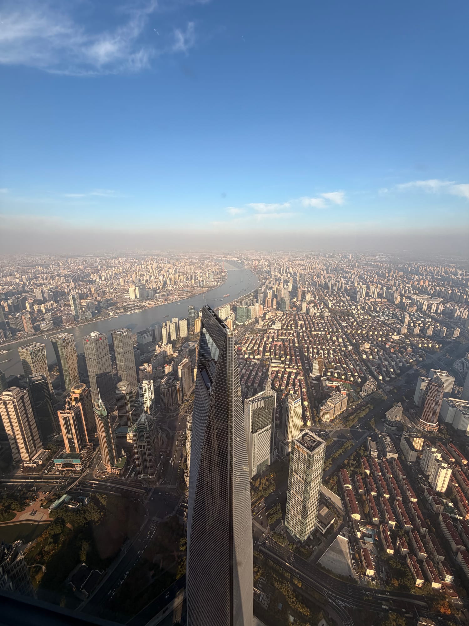 Trip photo: straight down the flank of Shanghai Tower, twenty seconds of elevator later